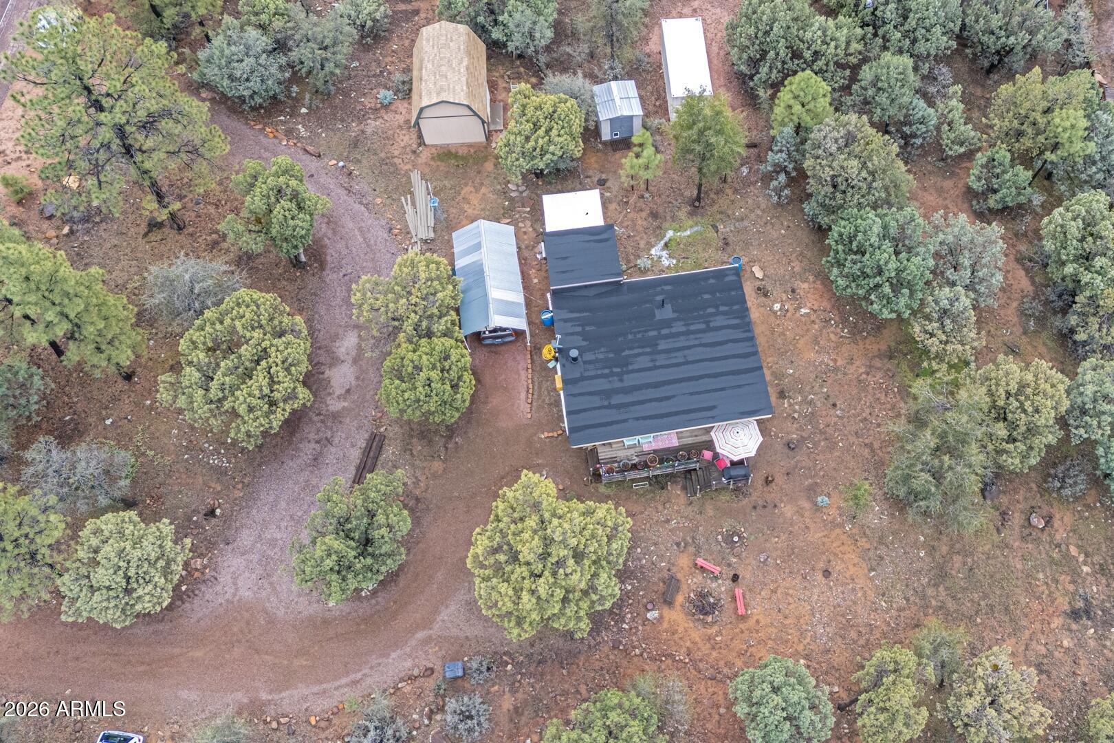 4120 North Whispering Pine Road Pine, AZ 85544 - Photo 29 of 30 a view of a back yard of the house