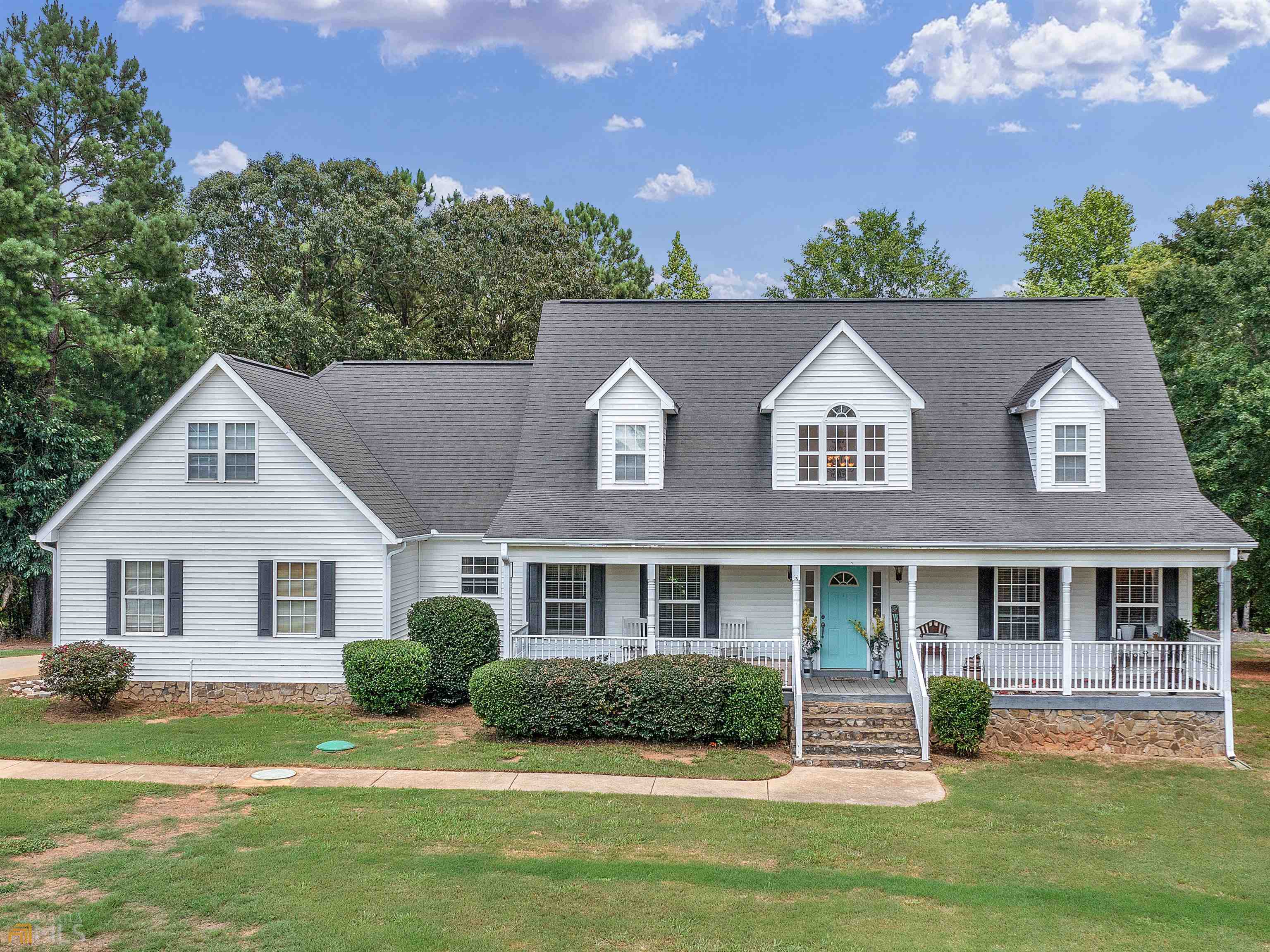 308 Rising Star Church Road Jackson, GA 30233 - Photo 1 of 1 a view of a yard in front of a house