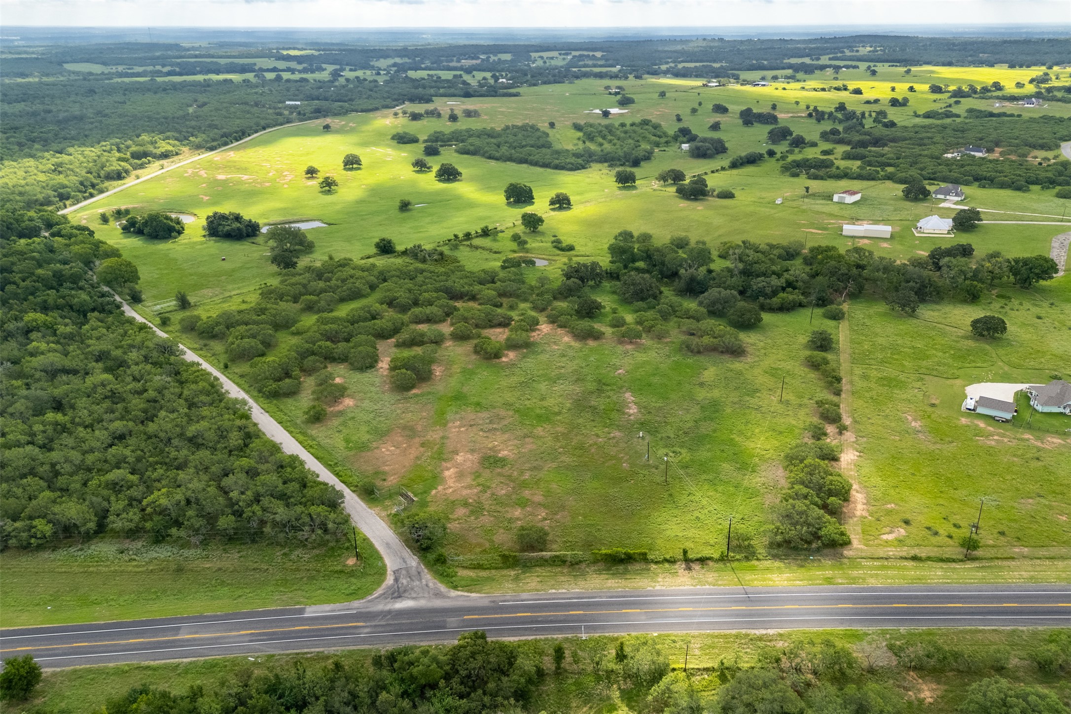 5485 County Road 249 Luling, TX 78648 - Photo 19 of 23 Aerial view of property and surrounding area featuring rural landscape