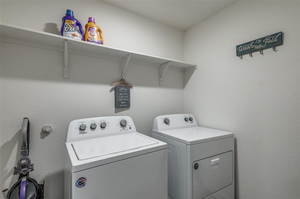 5525 McMahan Lane Fort Worth, TX 76036 - Photo 13 of 21 a utility room with dryer and washer