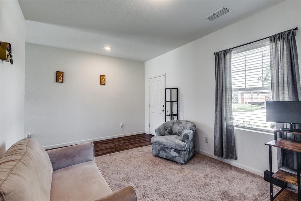 5525 McMahan Lane Fort Worth, TX 76036 - Photo 6 of 21 a living room with furniture and a window