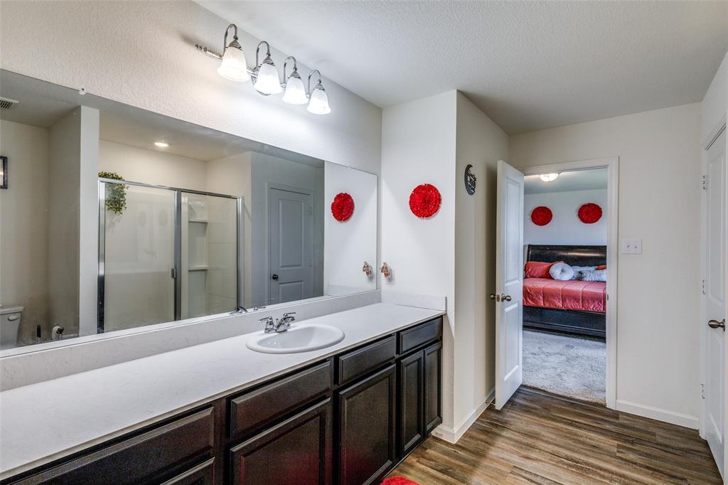 5525 McMahan Lane Fort Worth, TX 76036 - Photo 10 of 21 a bathroom with a sink and a mirror
