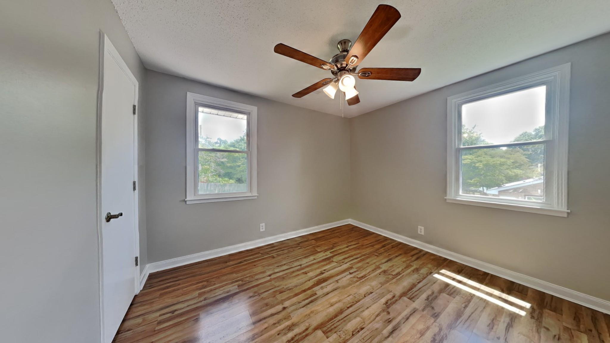 1307 Old Gratton Road Clarksville, TN 37043 - Photo 5 of 10 a view of a room with wooden floor and window