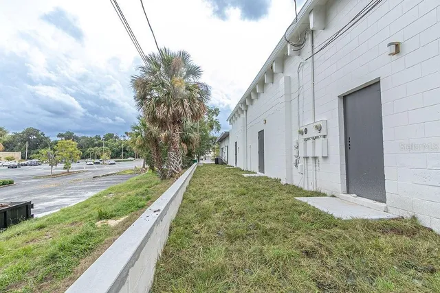 a view of a backyard of the house
