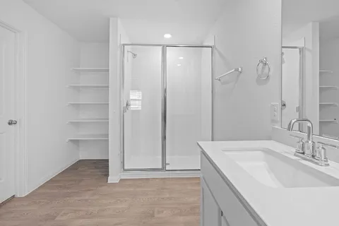 a bathroom with a sink and a mirror