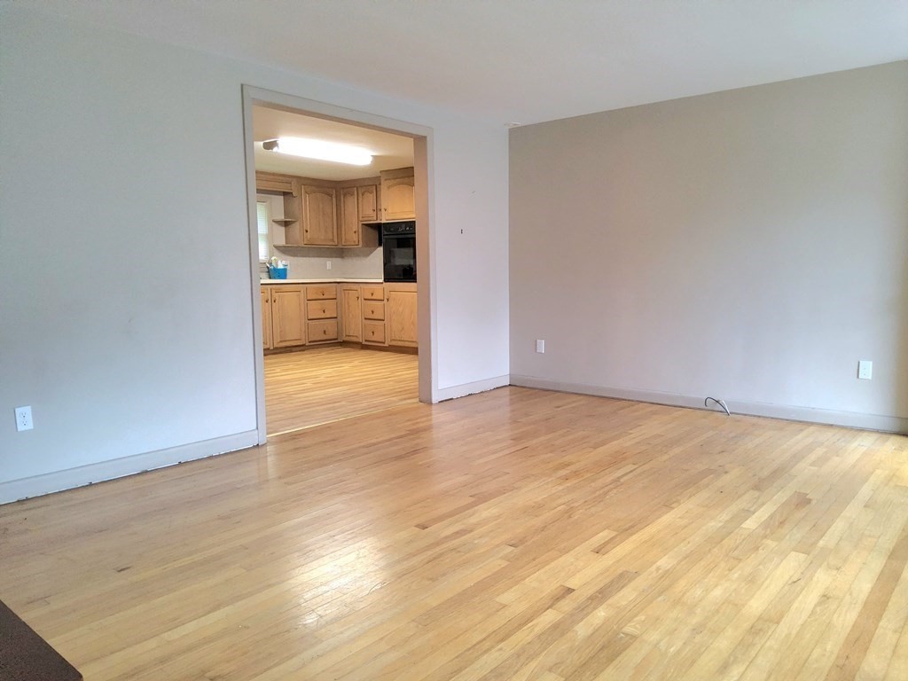 46 Lake Parkway Webster, MA 01570 - Photo 11 of 42 a view of a room with wooden floor and bathroom