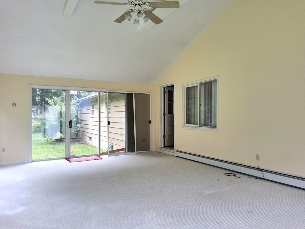 46 Lake Parkway Webster, MA 01570 - Photo 33 of 42 a view of an empty room with a window
