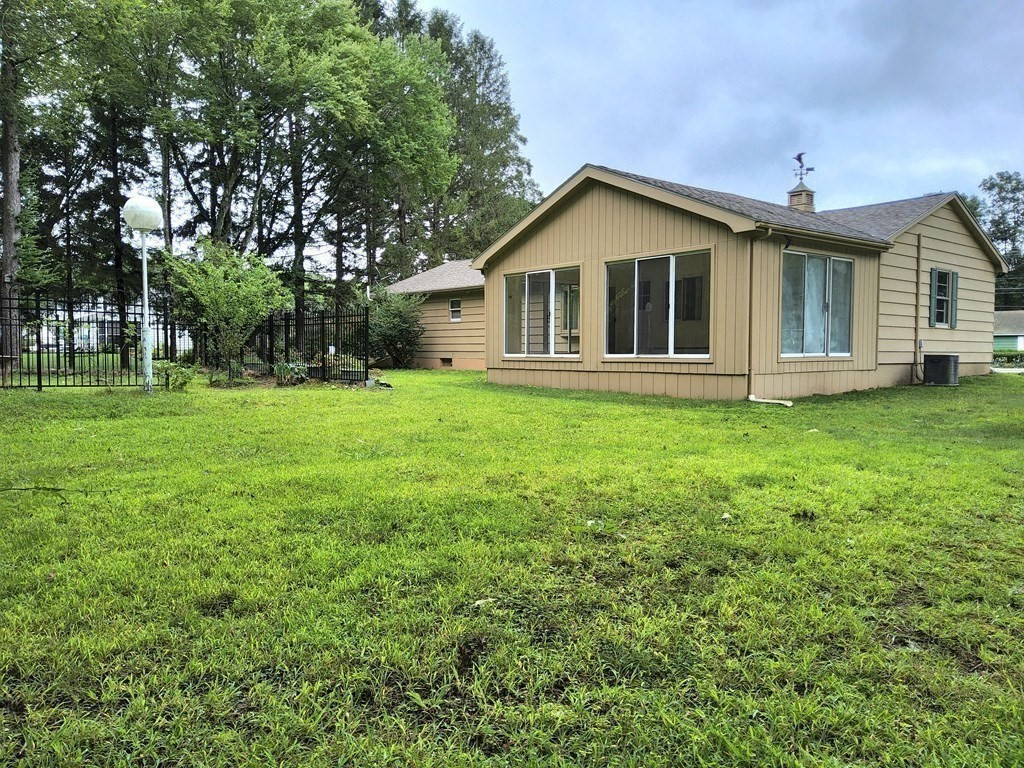 46 Lake Parkway Webster, MA 01570 - Photo 37 of 42 a view of a house with a yard