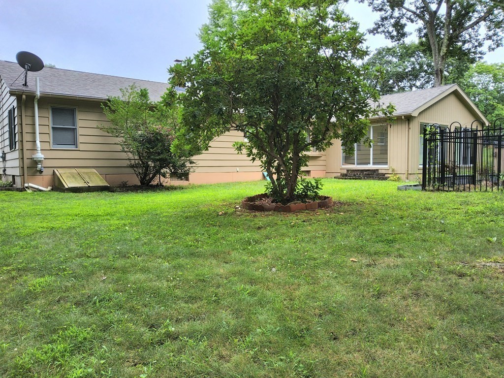 46 Lake Parkway Webster, MA 01570 - Photo 6 of 42 a view of a house with backyard and a tree