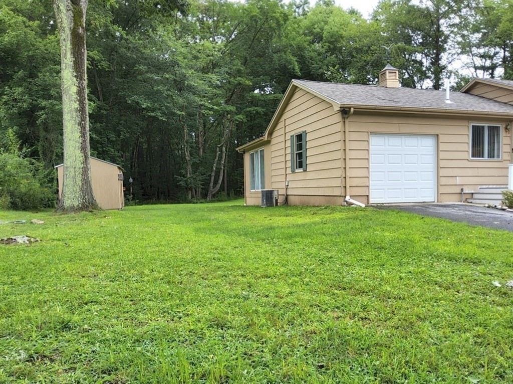 46 Lake Parkway Webster, MA 01570 - Photo 9 of 42 a view of a house with yard and tree s