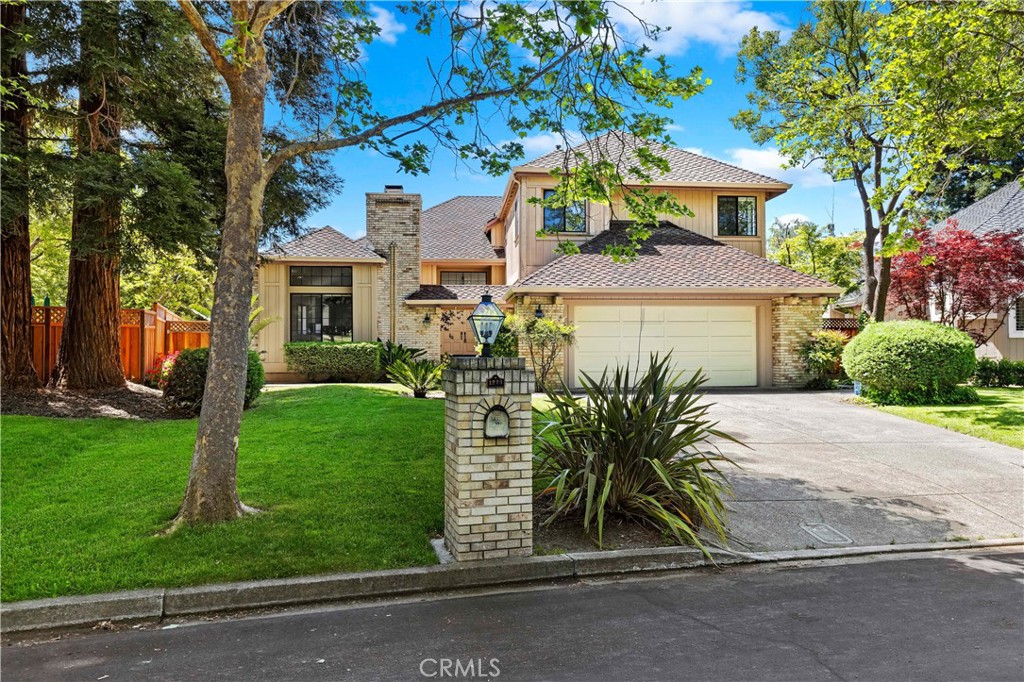 1223 Whispering Oaks Drive Danville, CA 94506 - Photo 1 of 1 a view of a house with a yard and a garden