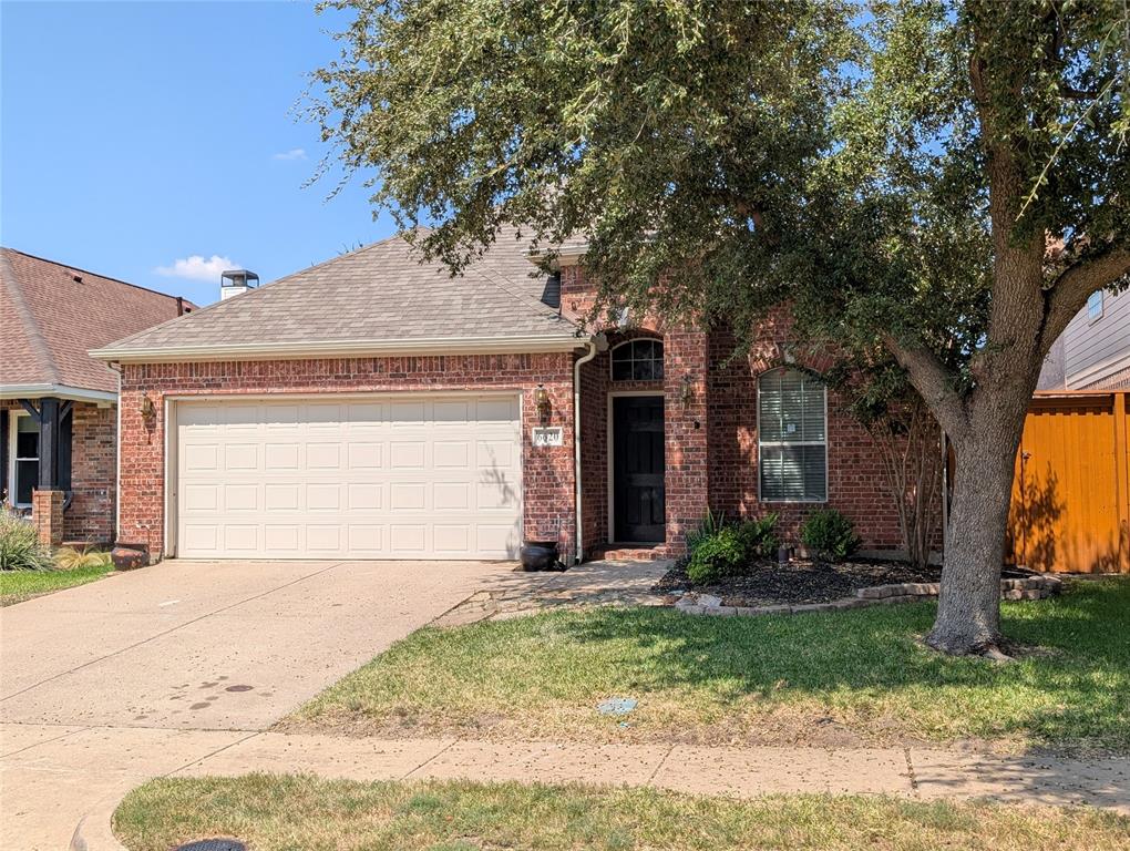6620 Crator Drive McKinney, TX 75070 - Photo 2 of 26 a front view of house with yard