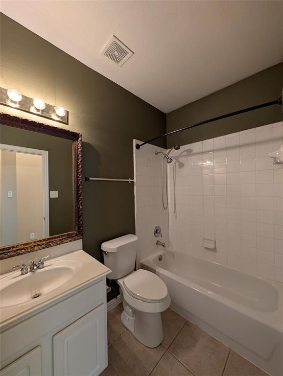 6620 Crator Drive McKinney, TX 75070 - Photo 23 of 26 a bathroom with a sink a toilet and shower