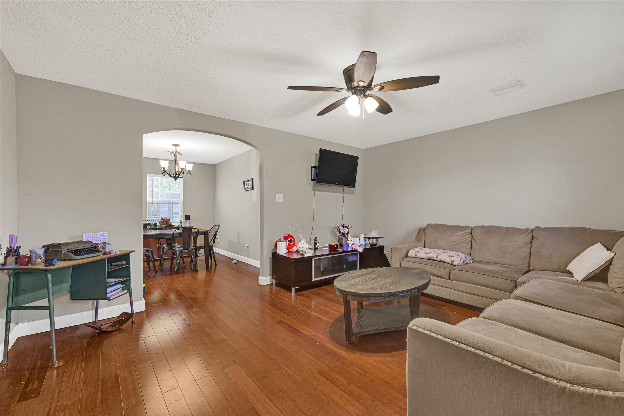 4529 Perry Street Houston, TX 77021 - Photo 3 of 20 a living room with furniture and a wooden floor