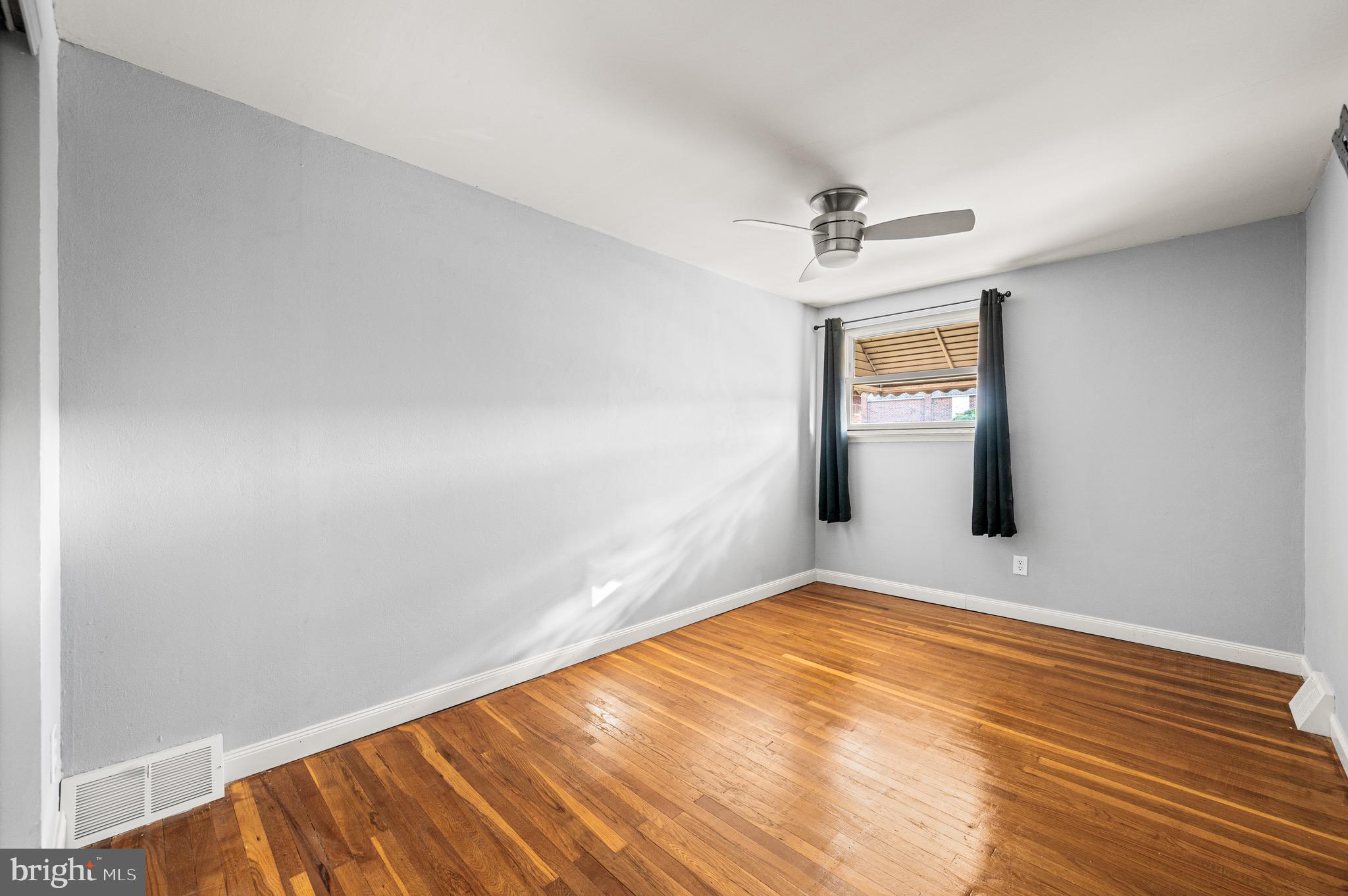 3583 Nottingham Lane Philadelphia, PA 19114 - Photo 21 of 23 a view of an empty room and window