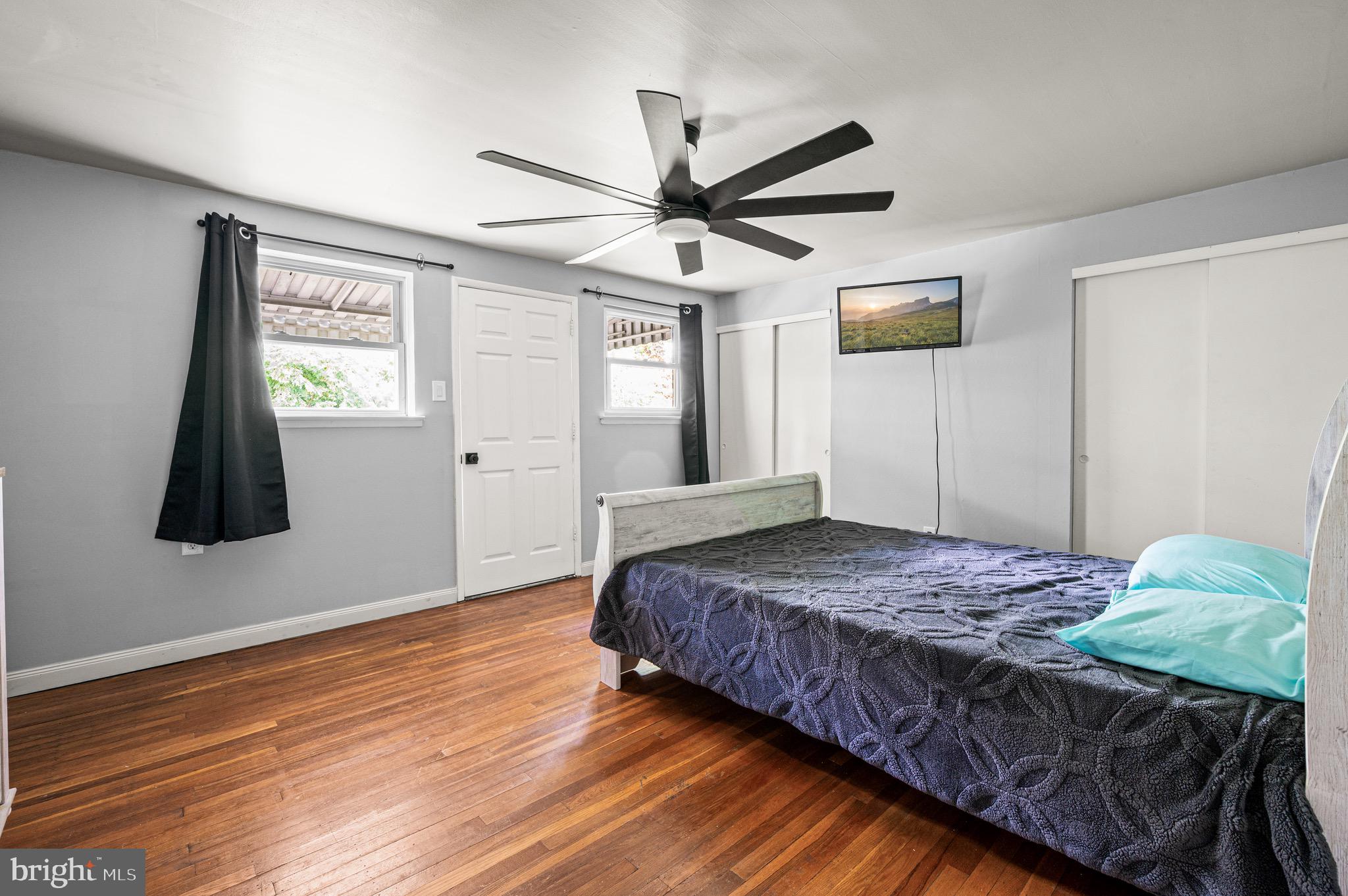 3583 Nottingham Lane Philadelphia, PA 19114 - Photo 4 of 23 a bedroom with a large bed and a window