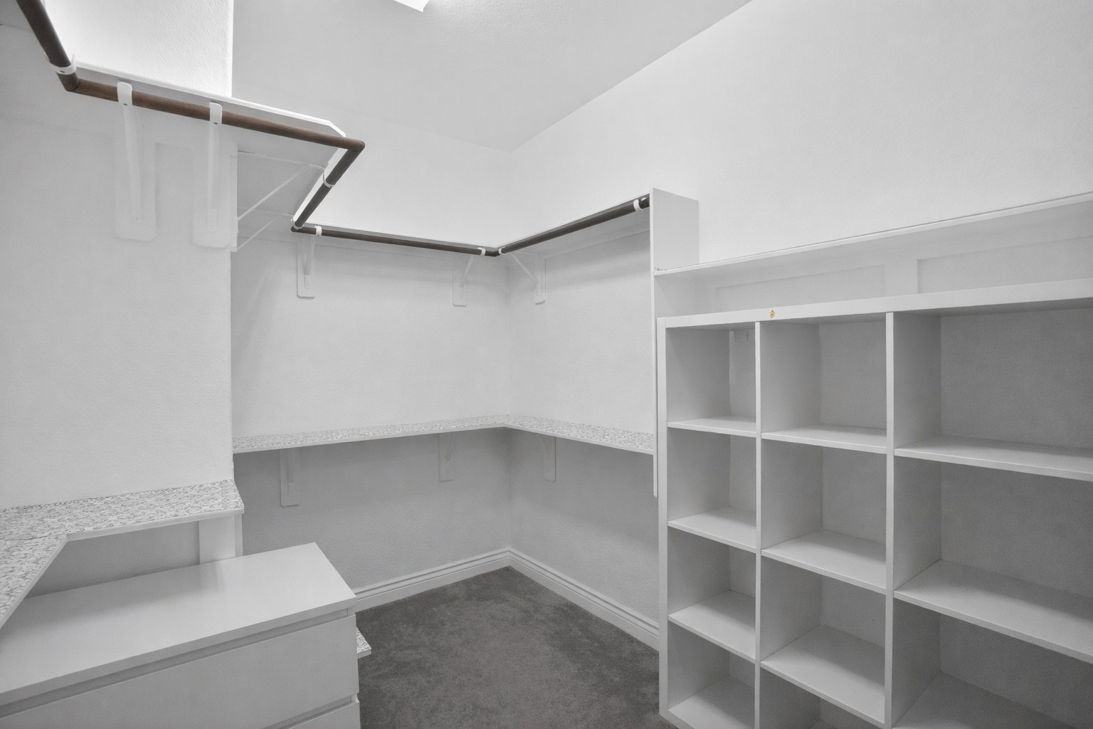 400 Cortona Lane Georgetown, TX 78628 - Photo 22 of 40 Walk in closet featuring dark carpet