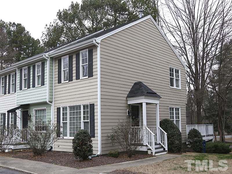 2554 Noble Road Raleigh, NC 27608 - Photo 1 of 11 a front view of a house with garden