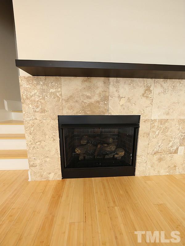 2554 Noble Road Raleigh, NC 27608 - Photo 4 of 11 a close view of a fireplace in an empty room