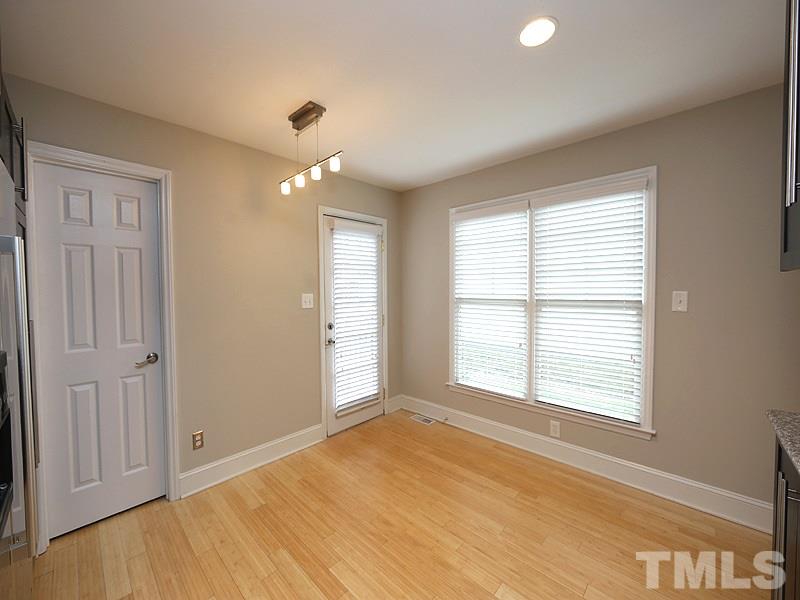 2554 Noble Road Raleigh, NC 27608 - Photo 7 of 11 a view of an empty room with a window
