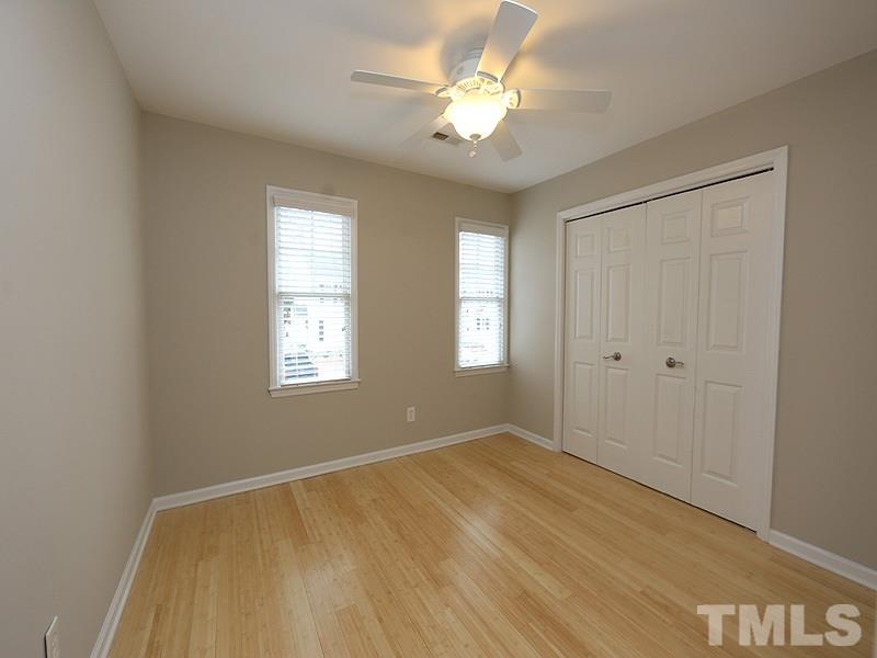 2554 Noble Road Raleigh, NC 27608 - Photo 9 of 11 a view of an empty room with a window