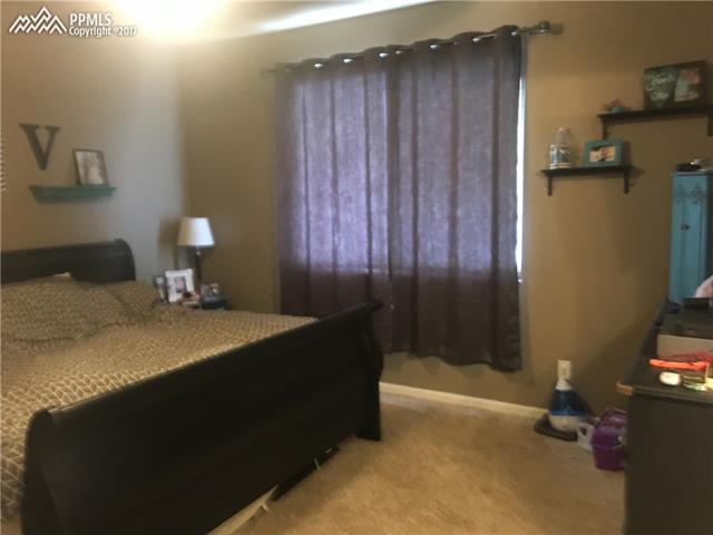 7583 Coffee Road Peyton, CO 80831 - Photo 5 of 12 Master Bedroom