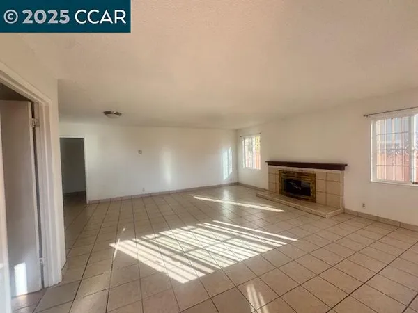 a view of kitchen with furniture and fireplace
