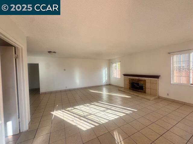 a view of kitchen with furniture and fireplace