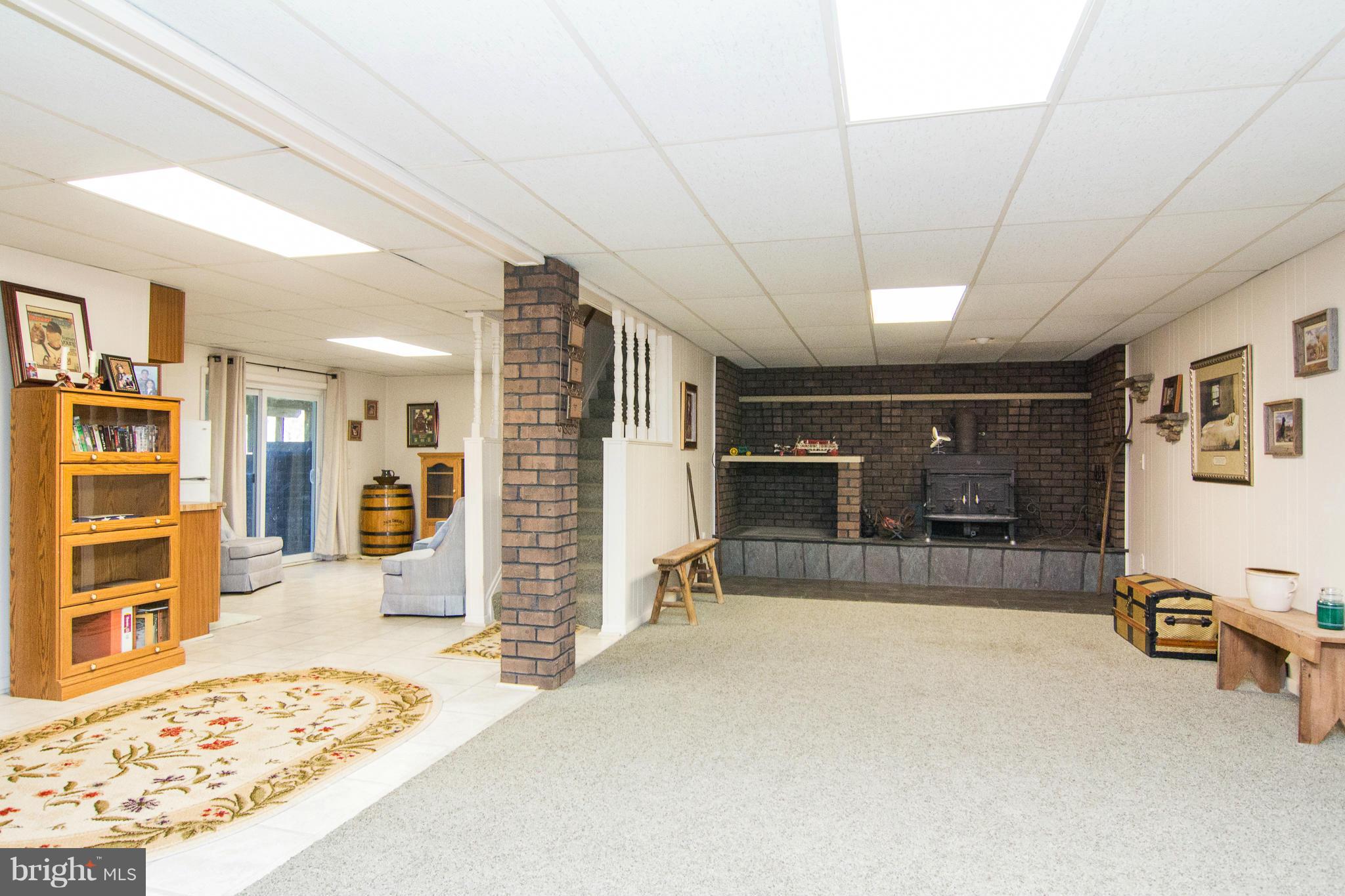 1918 Tyrone Road Westminster, MD 21158 - Photo 24 of 30 Recreation Room w/Wood Stove / Wood Box