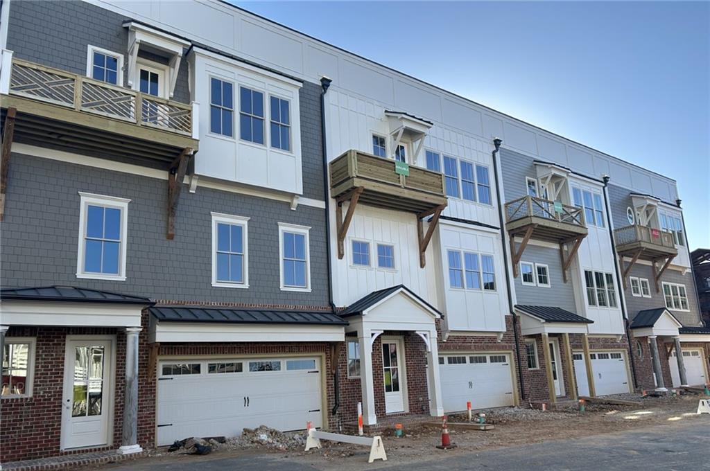 4213 Legacy Lane, Unit 32 Acworth, GA 30101 - Photo 1 of 1 a front view of a building with many windows