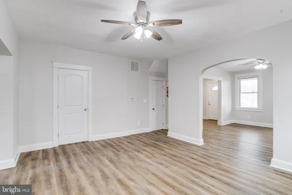 a kitchen with stainless steel appliances granite countertop a refrigerator stove and sink