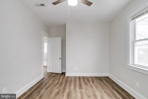 a bathroom with a sink a toilet and bathtub