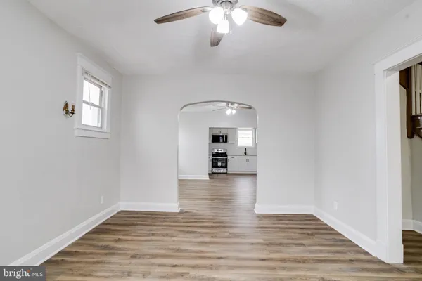 a view of a livingroom with wooden floor