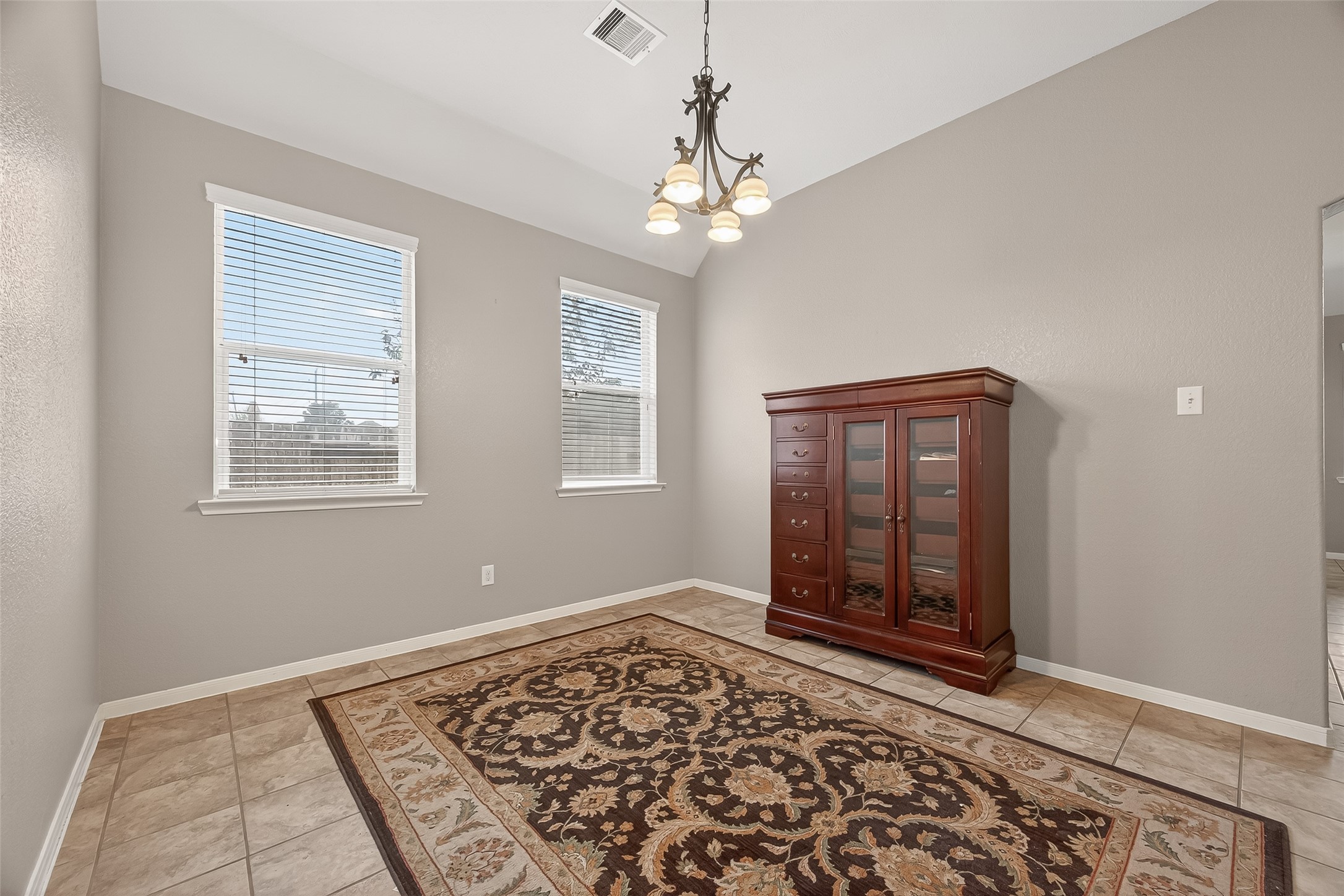 9110 Cavalier Lane Rosenberg, TX 77469 - Photo 6 of 30 The dining room features plenty of space to host large gatherings.