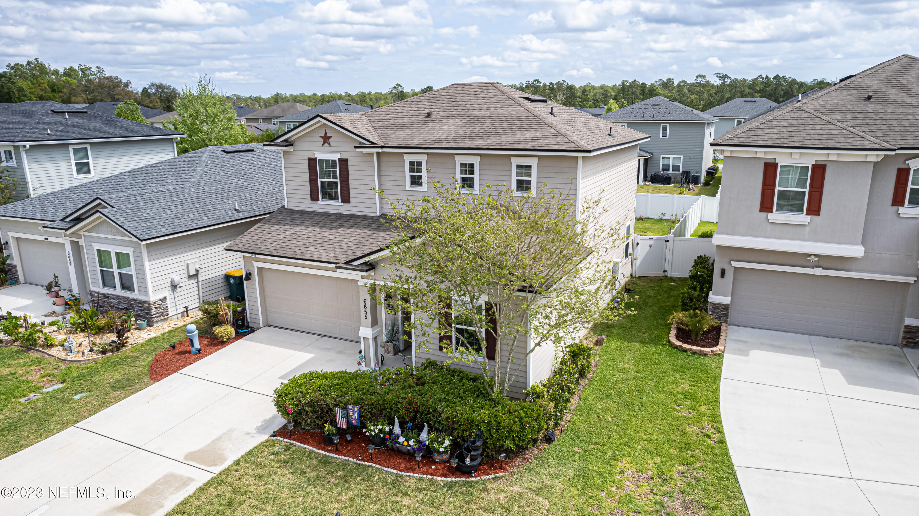 6655 Azalea Park Road Jacksonville, FL 32259 - Photo 34 of 41 front view of a house with a yard