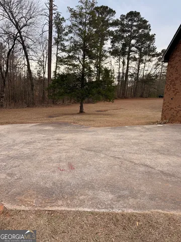 a view of open space with trees