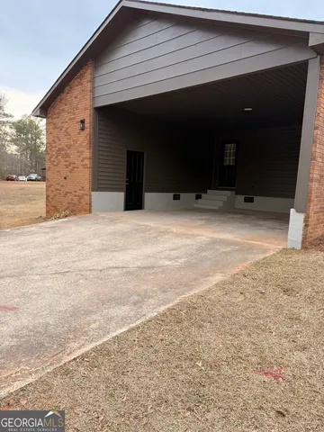 a view of a house with a patio