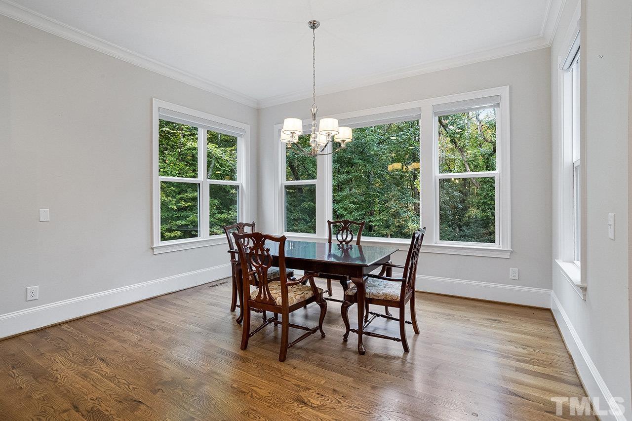 12309 Creedmoor Road Raleigh, NC 27613 - Photo 13 of 38 a dining room with furniture window outside view and dining space