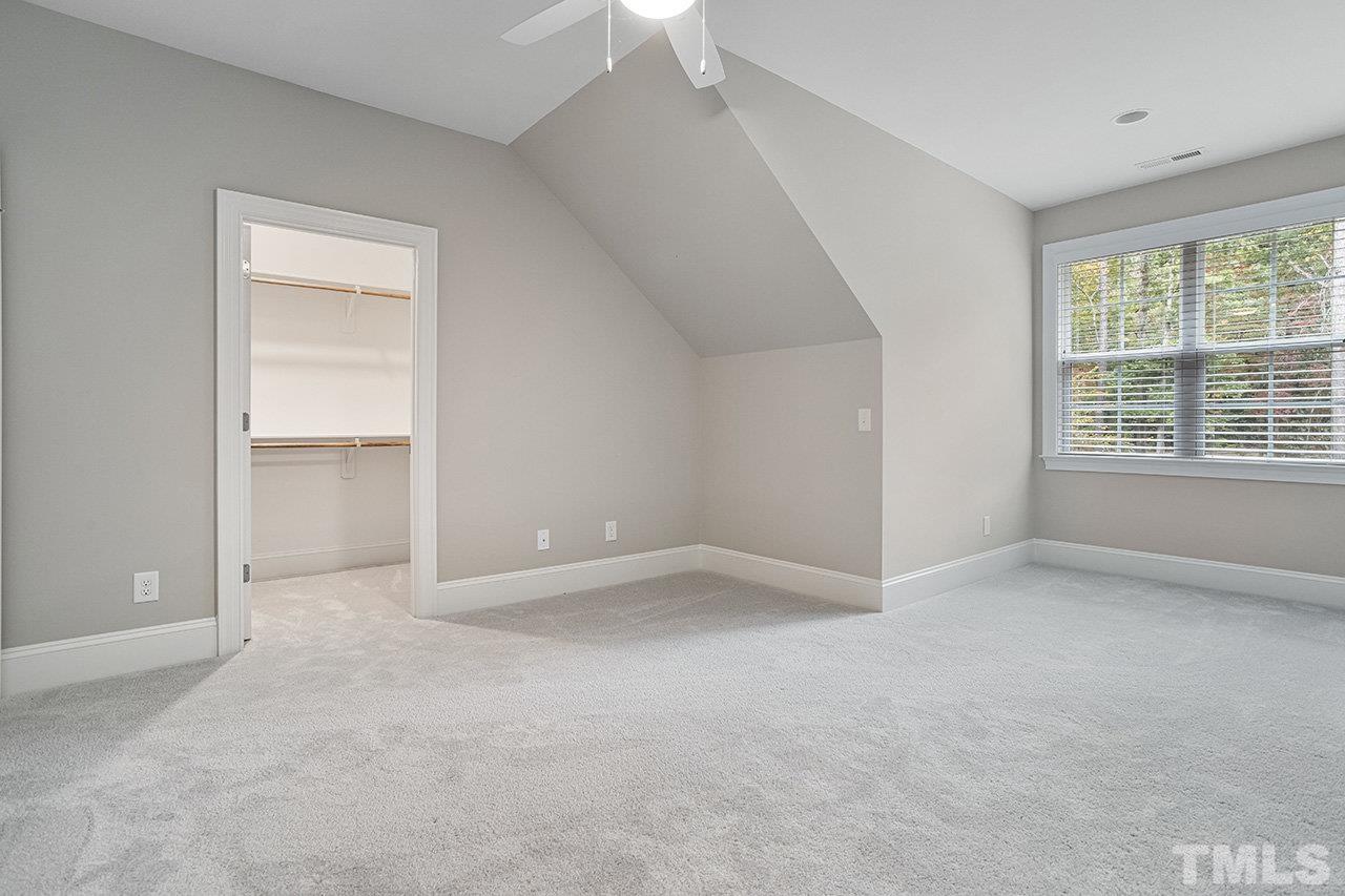 12309 Creedmoor Road Raleigh, NC 27613 - Photo 30 of 38 an empty room with a empty space and windows