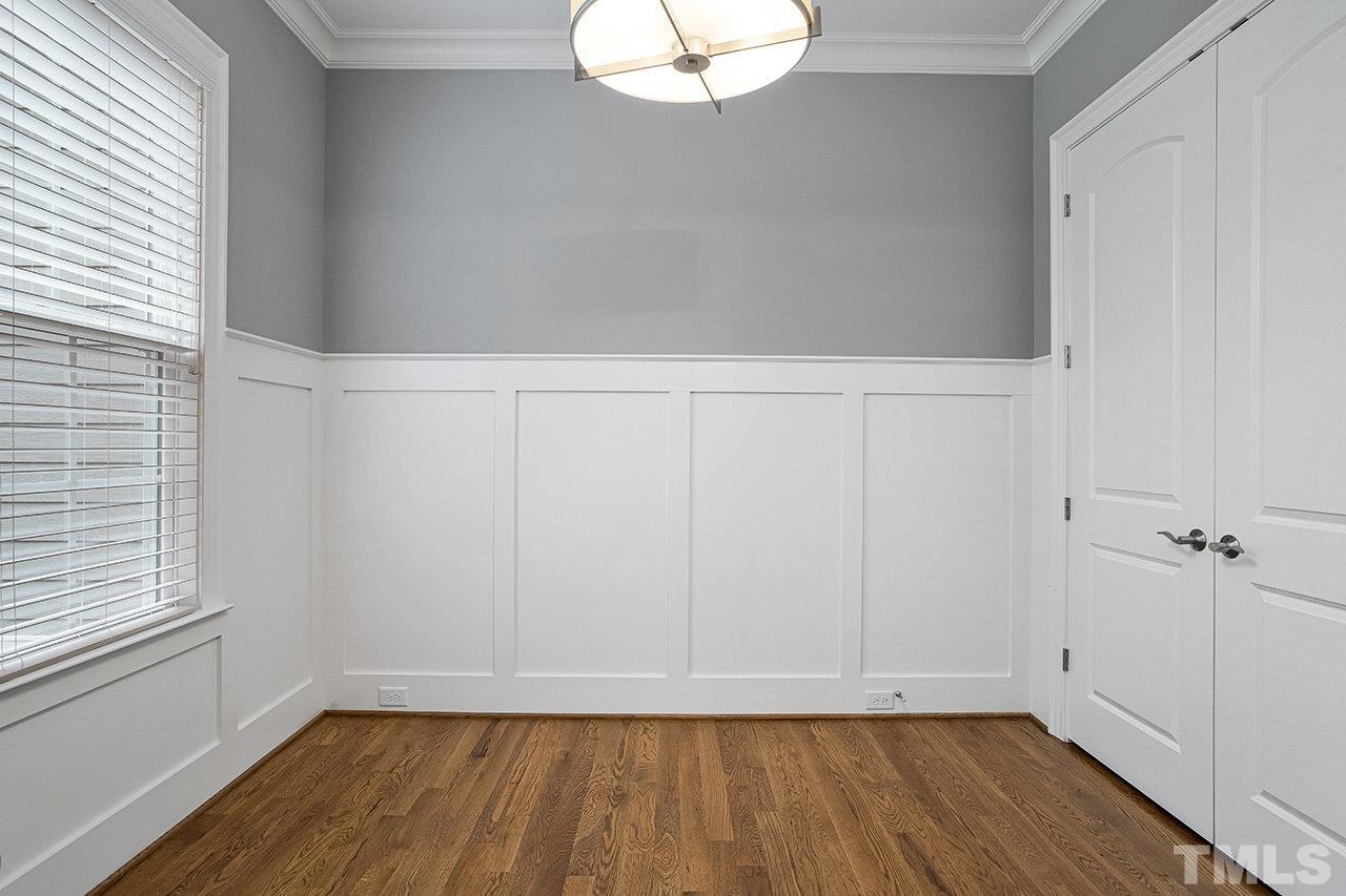 12309 Creedmoor Road Raleigh, NC 27613 - Photo 5 of 38 a view of room with window and hardwood floor