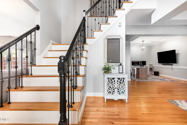 a view of a living room and a flat screen tv