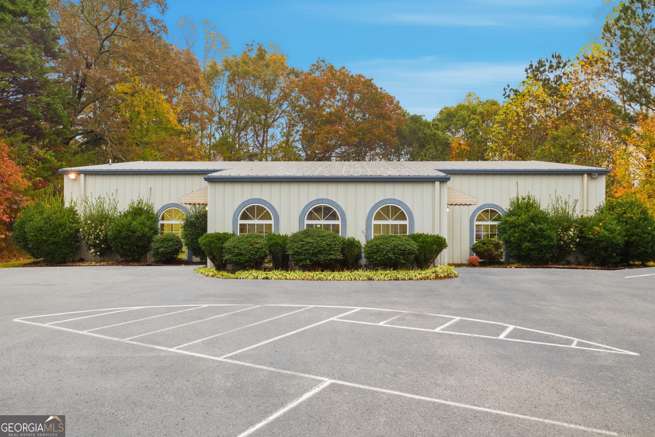 300 Hills Crossing Road Clarkesville, GA 30523 - Photo 1 of 1 a front view of a house with garden