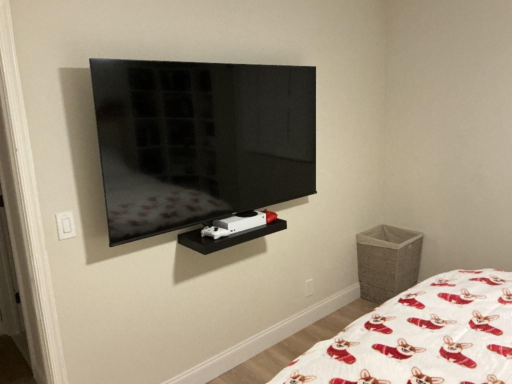 9774 Lancaster Place Boca Raton, FL 33434 - Photo 11 of 13 a bedroom with a bed and a wall