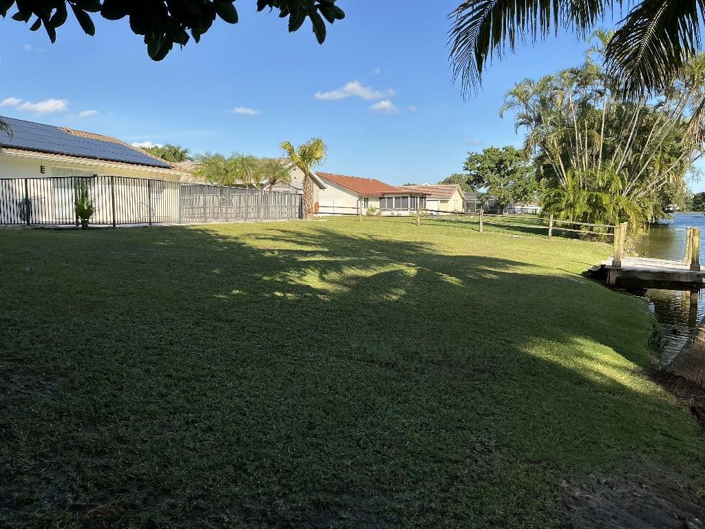 9774 Lancaster Place Boca Raton, FL 33434 - Photo 3 of 13 a view of an ocean with a big yard