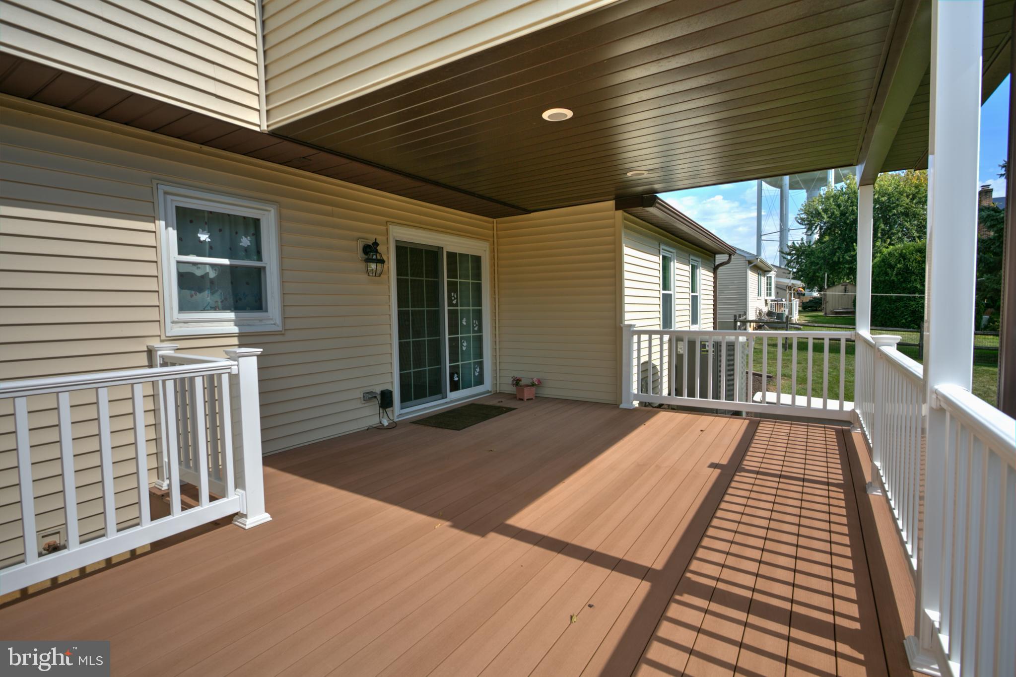 906 Tuckerton Road Reading, PA 19605 - Photo 8 of 28 Maintenance-Free Deck/Newer Sliding Glass Door