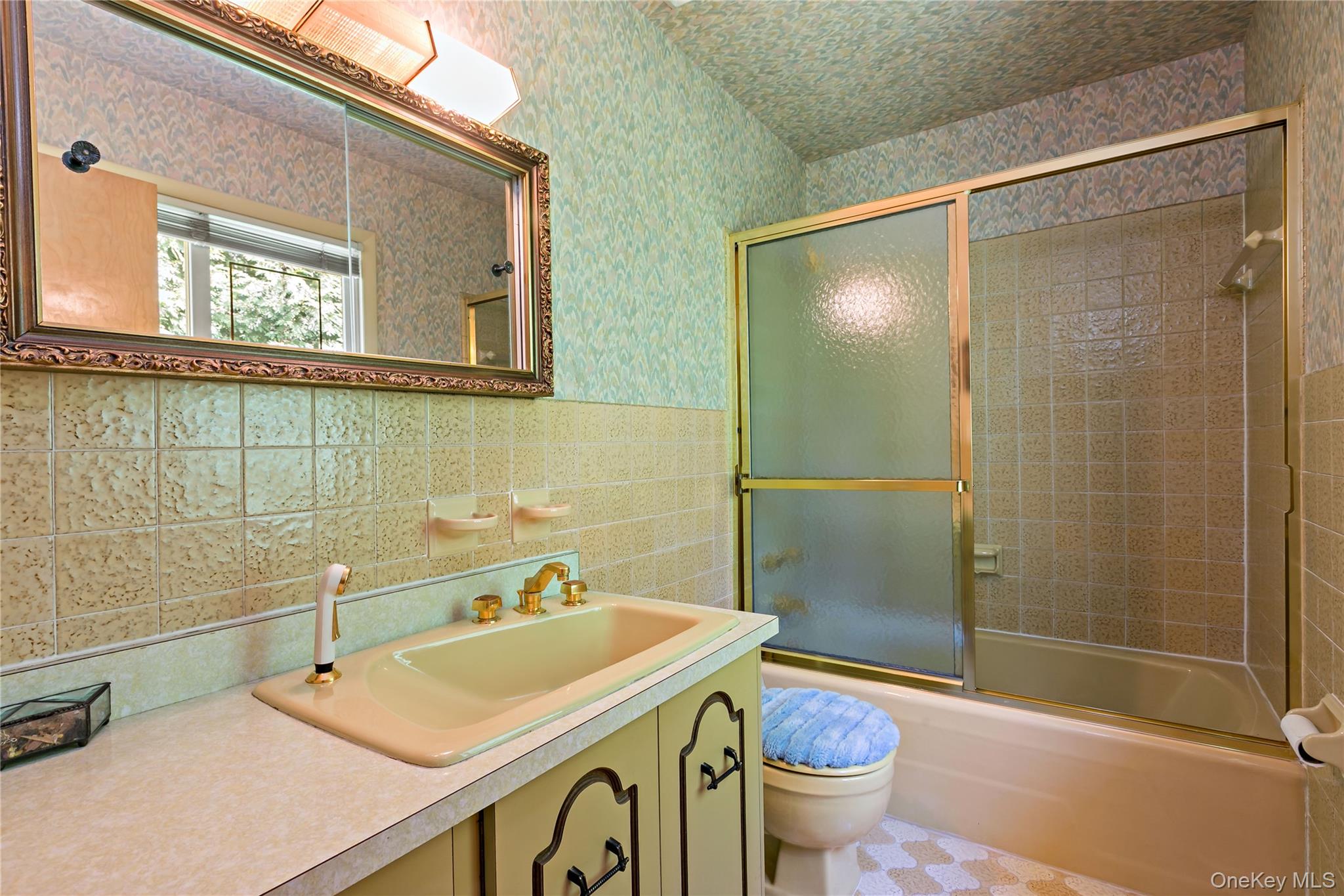 16 Meadow Road Scarsdale, NY 10583 - Photo 28 of 47 a bathroom with a sink toilet and shower
