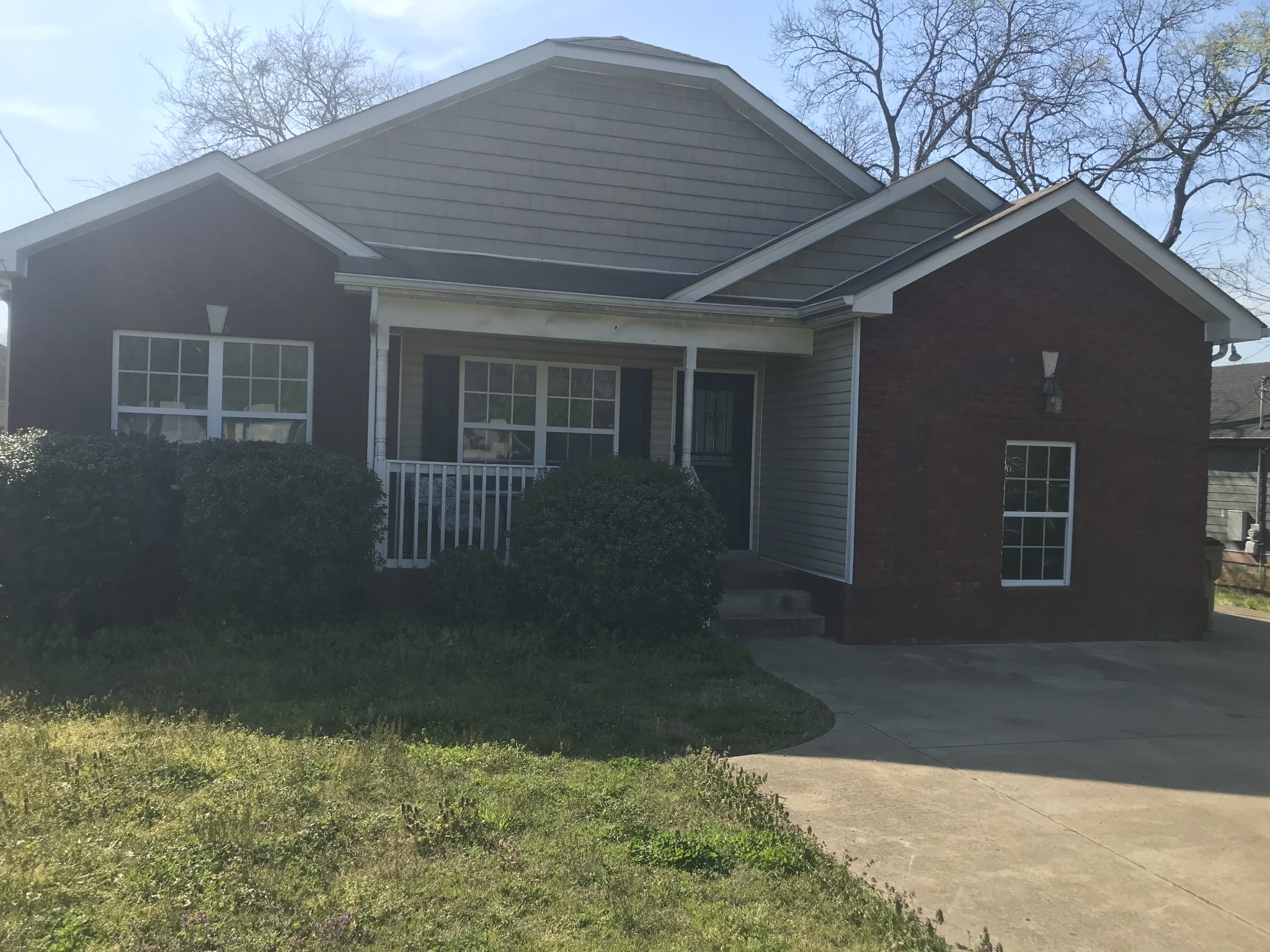 224 Larkin Springs Road Madison, TN 37115 - Photo 1 of 6 a front view of house with yard