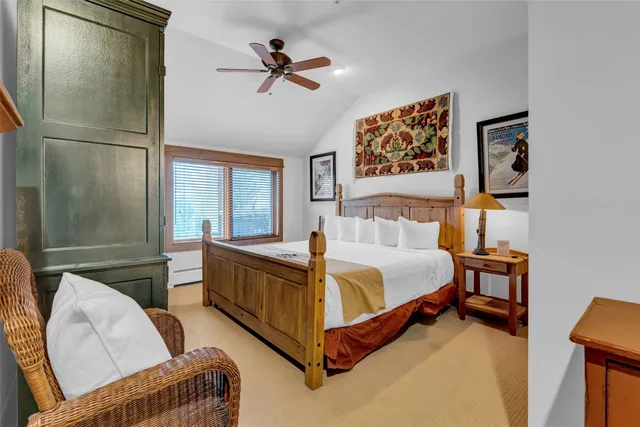 a bed room with a bed and a couch