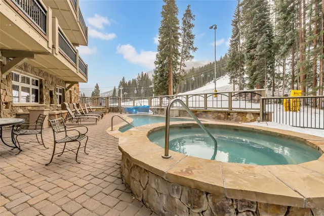 a view of a swimming pool with a lounge chairs