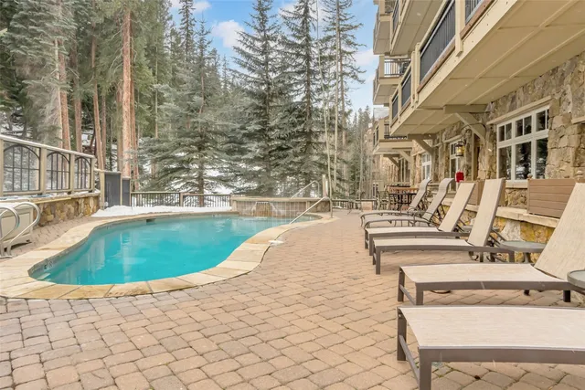 a view of outdoor space with swimming pool